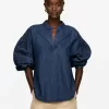 Jeansbluse mit voluminösen Ärmeln Jeansbluse mit voluminösen Ärmeln