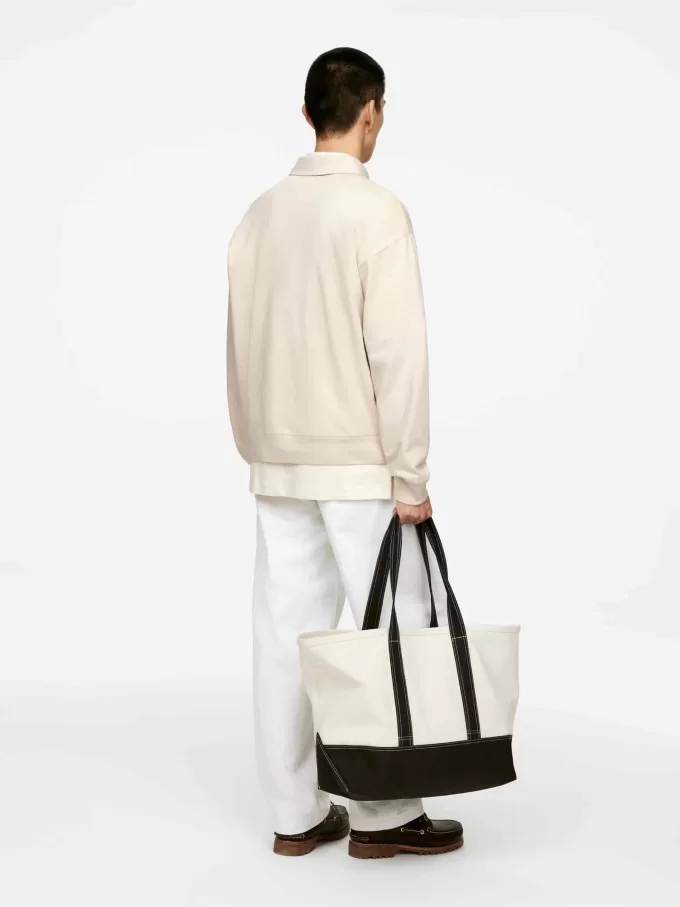 Poloshirt mit halbem Reißverschluss Poloshirt mit halbem Reißverschluss