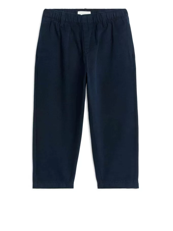 Schmal zulaufende Baumwoll-Chinos Schmal zulaufende Baumwoll-Chinos